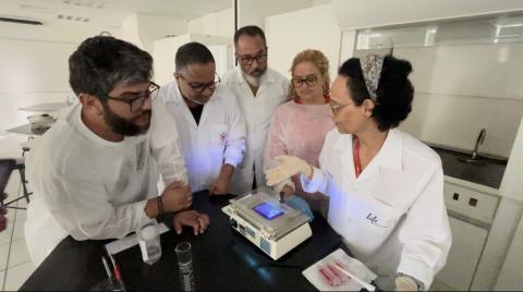 Brasilio Machado School team talking to professor Ana Paula Costa